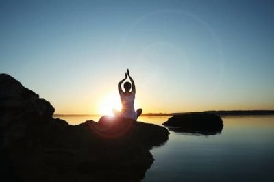 Woman meditating finding her inner peace and resolve from depression